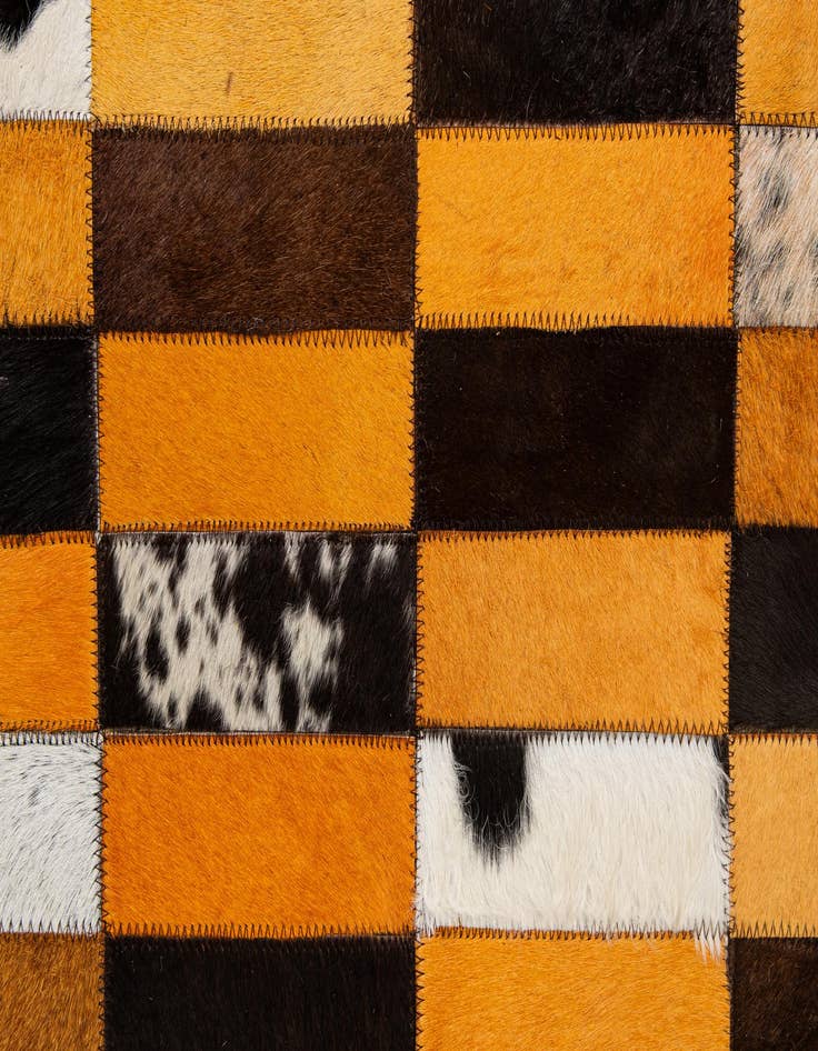 Detail image of  5' 1 x 7' 11 Cowhide - Patchwork Rug