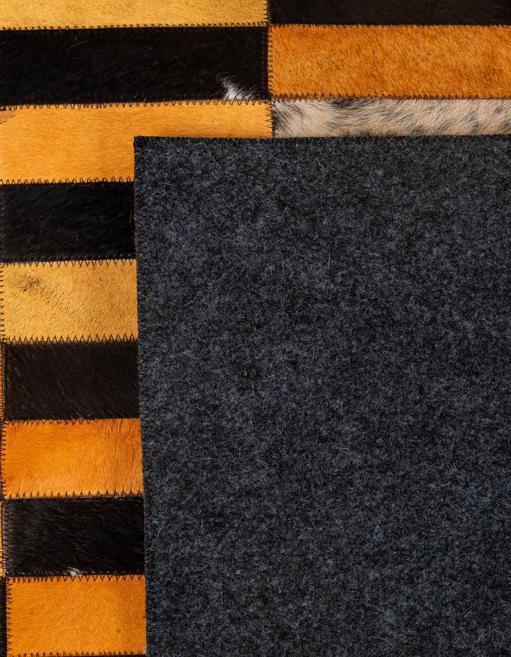 Detail image of  5' 1 x 7' 11 Cowhide - Patchwork Rug