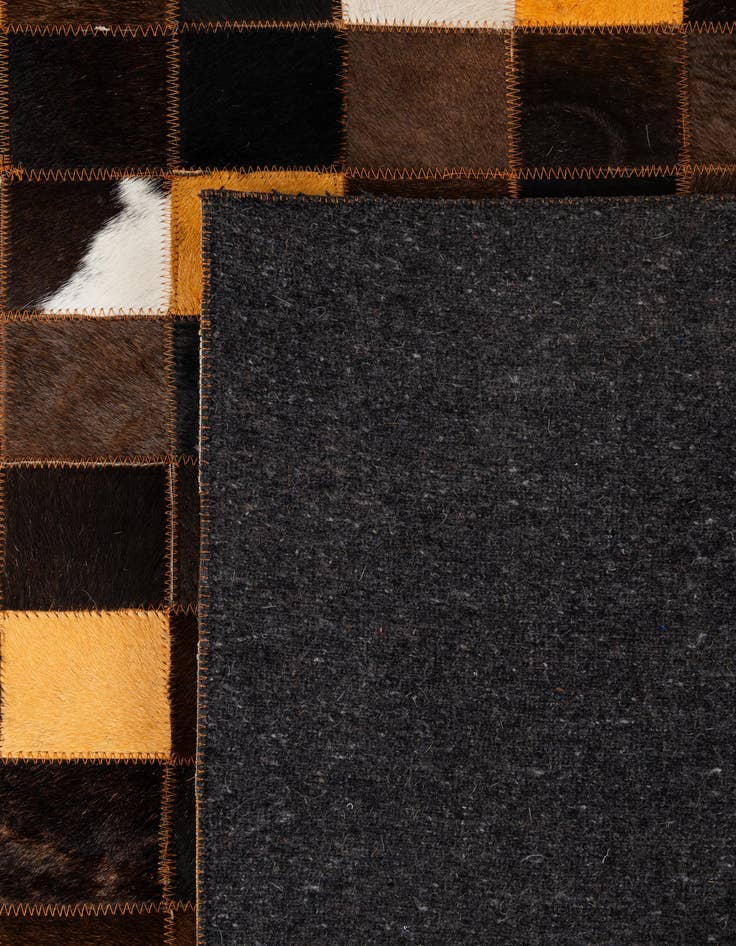 Detail image of  5' 1 x 8' 1 Cowhide - Patchwork Rug