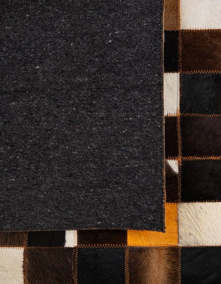 Detail image of  5' 2 x 8' Cowhide - Patchwork Rug