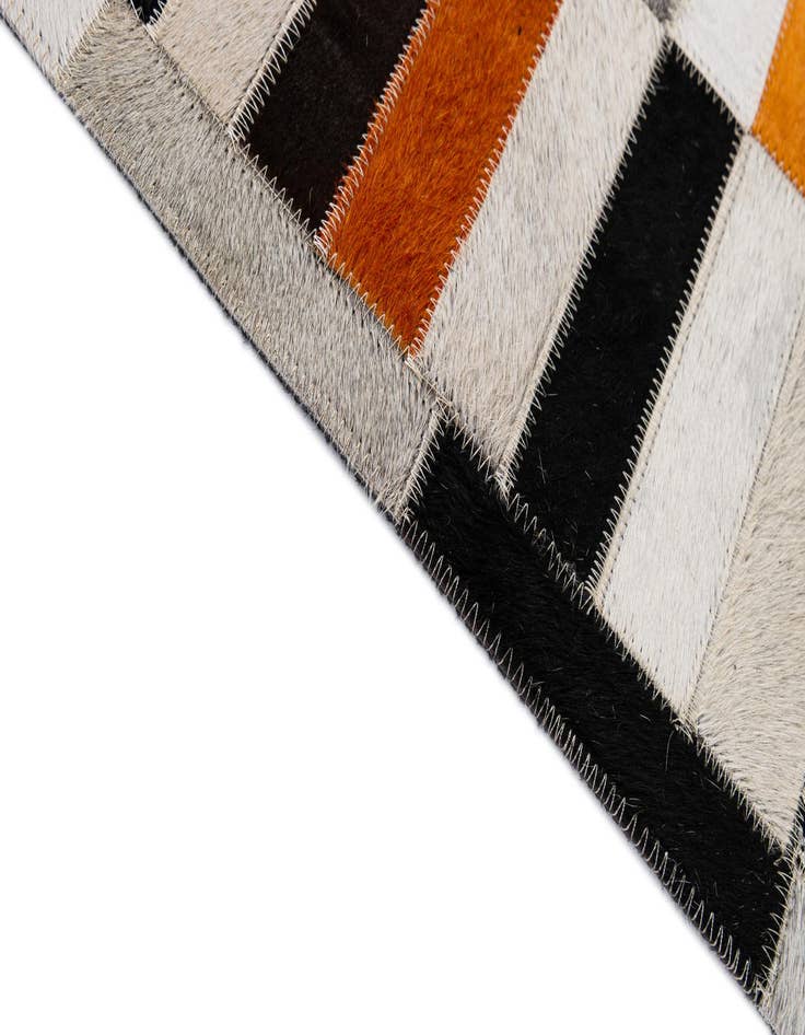 Detail image of  5' 2 x 8' 2 Cowhide - Patchwork Rug
