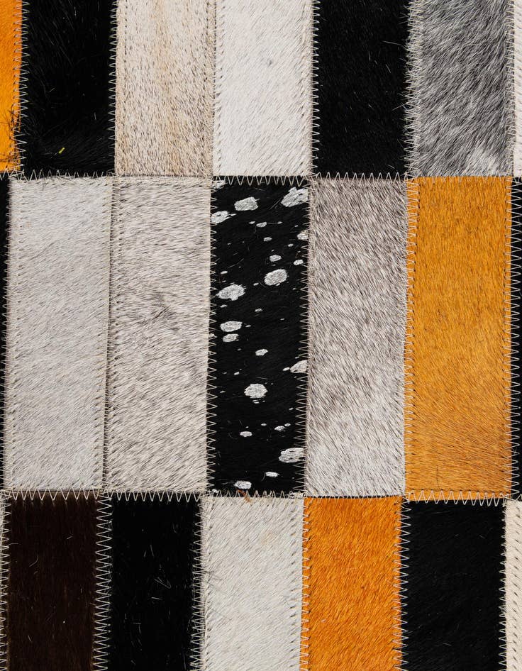 Detail image of  5' 2 x 8' 2 Cowhide - Patchwork Rug