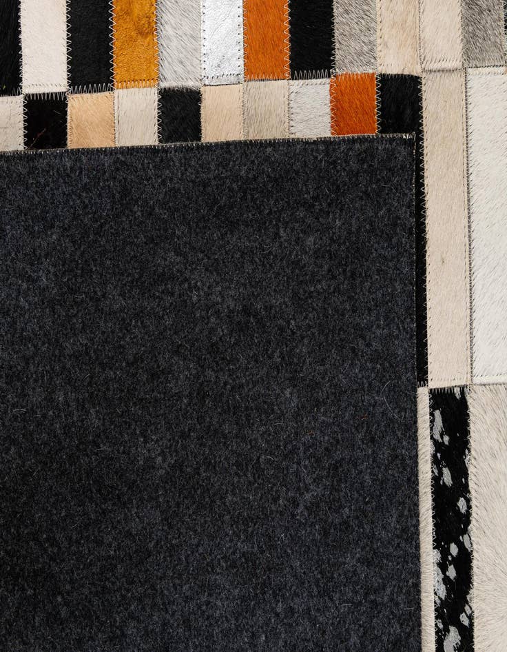 Detail image of  5' 2 x 8' 2 Cowhide - Patchwork Rug
