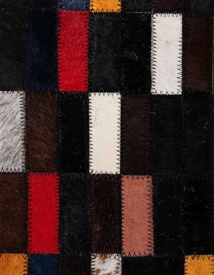 Detail image of  5' 2 x 7' 11 Cowhide - Patchwork Rug