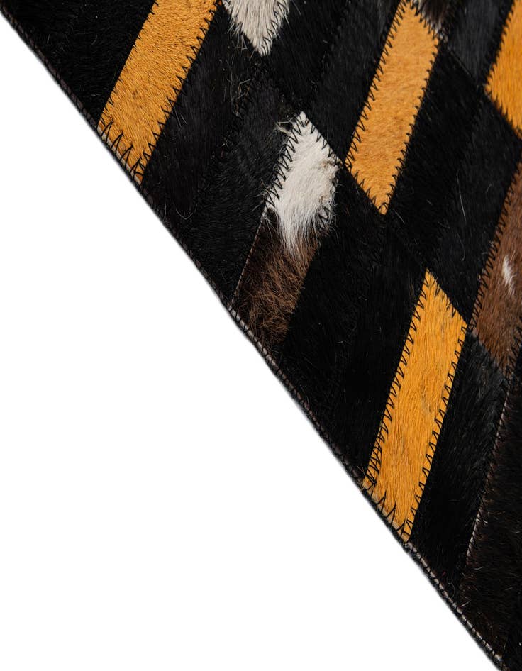 Detail image of  4' 11 x 8' 1 Cowhide - Patchwork Rug