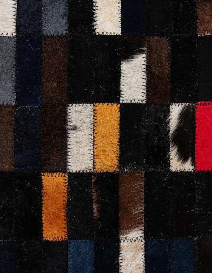 Detail image of  5' 2 x 7' 11 Cowhide - Patchwork Rug
