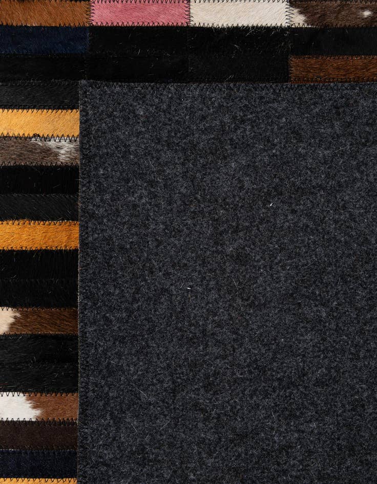 Detail image of  5' 2 x 7' 11 Cowhide - Patchwork Rug