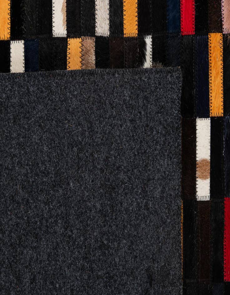 Detail image of  5' 2 x 7' 11 Cowhide - Patchwork Rug