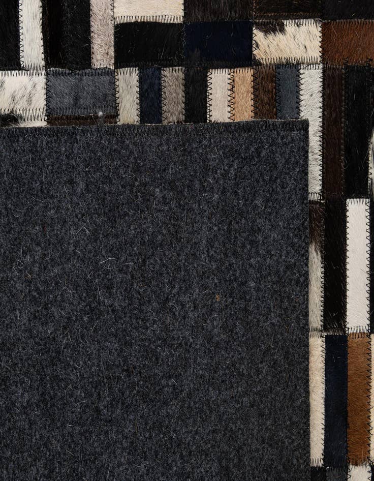 Detail image of  5' 1 x 8' 1 Cowhide - Patchwork Rug