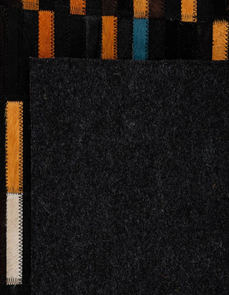 Detail image of  5' 2 x 7' 10 Cowhide - Patchwork Rug