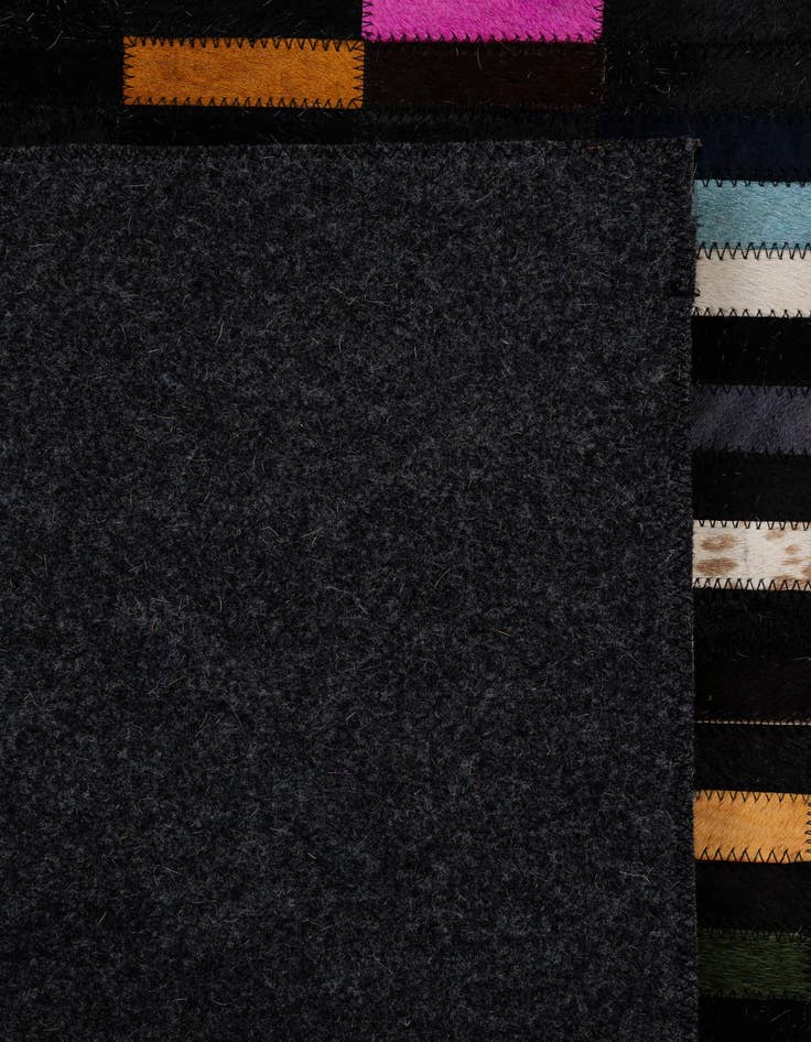 Detail image of  5' 2 x 8' Cowhide - Patchwork Rug