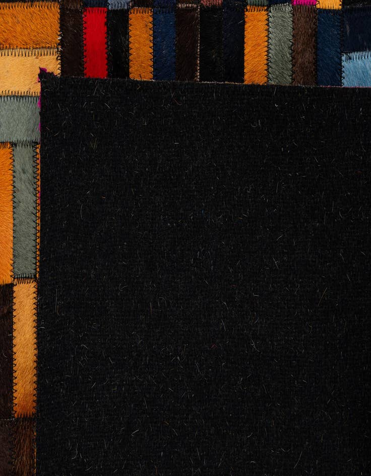 Detail image of  4' 11 x 7' 10 Cowhide - Patchwork Rug