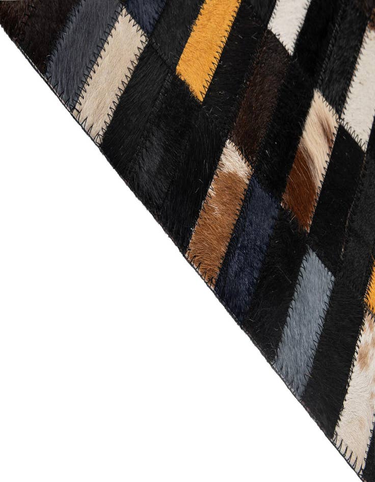 Detail image of  5' 2 x 8' Cowhide - Patchwork Rug