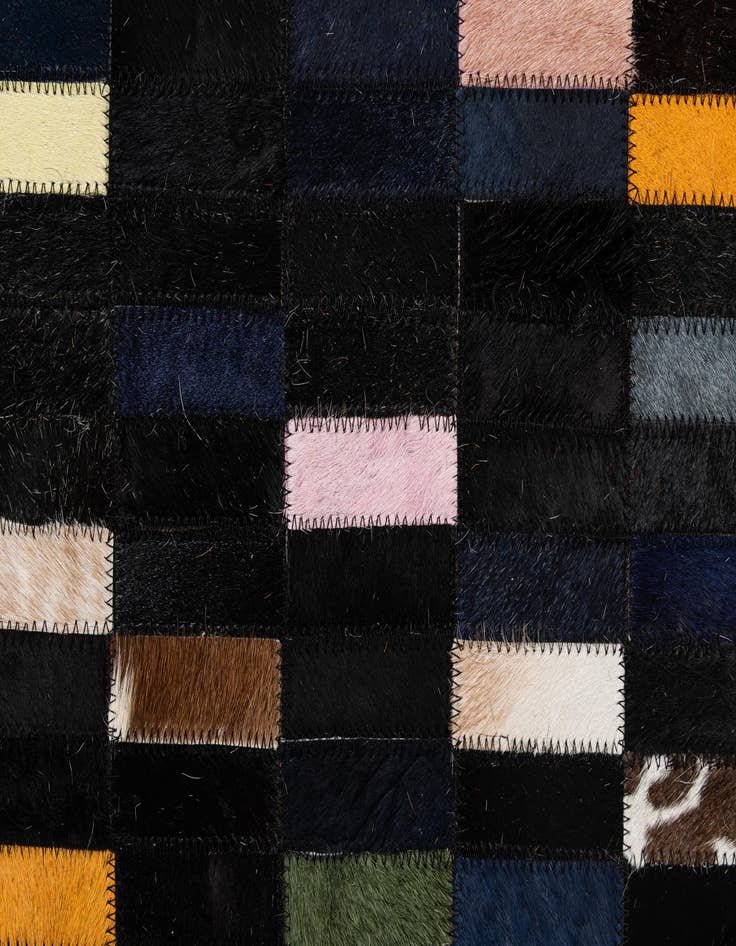 Detail image of  5' 2 x 7' 11 Cowhide - Patchwork Rug