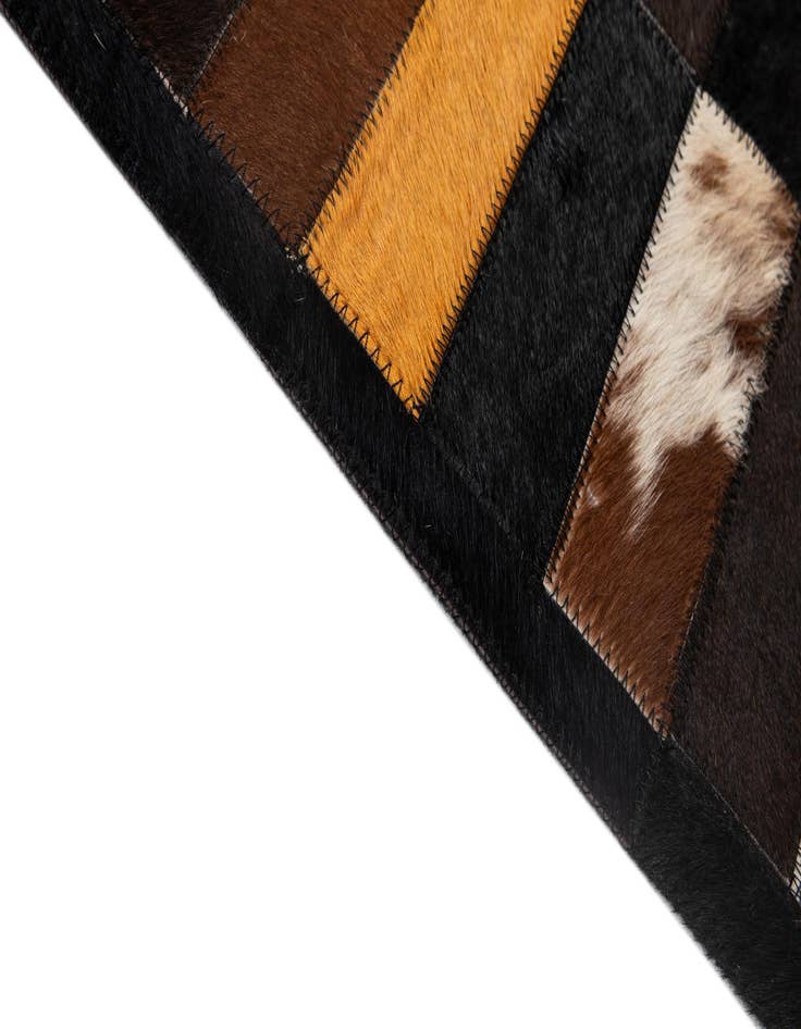 Detail image of  5' 2 x 8' 1 Cowhide - Patchwork Rug