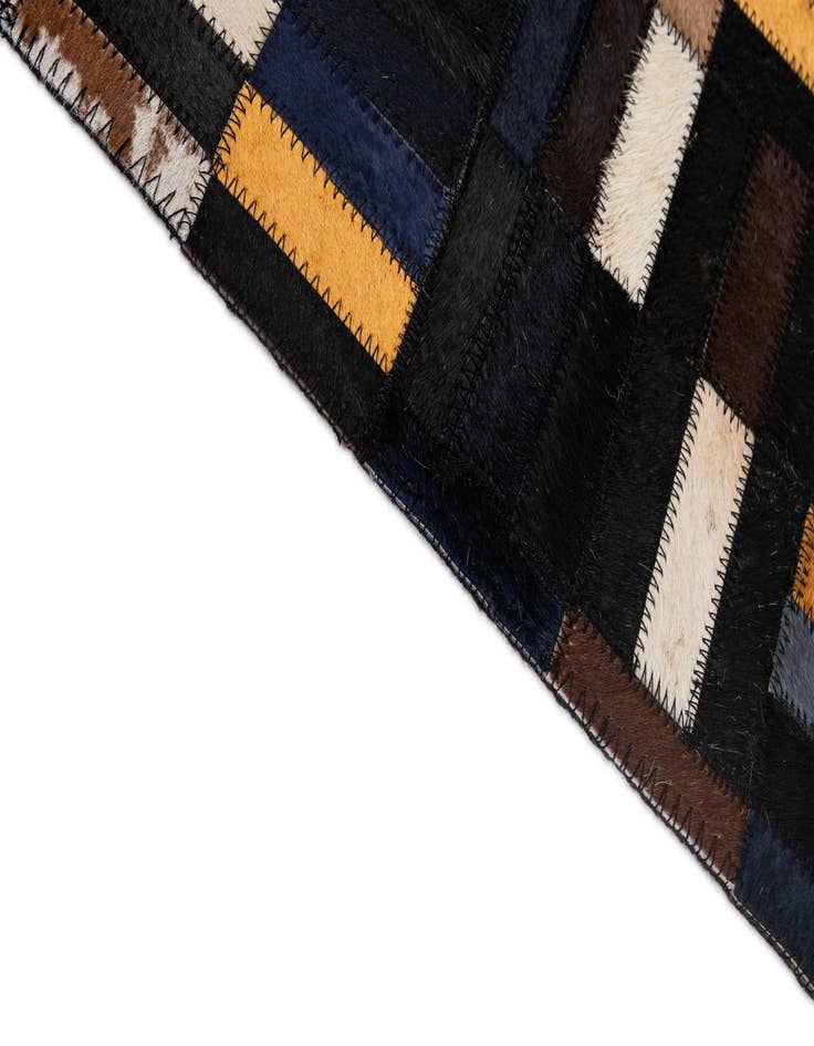 Detail image of  5' 1 x 7' 11 Cowhide - Patchwork Rug