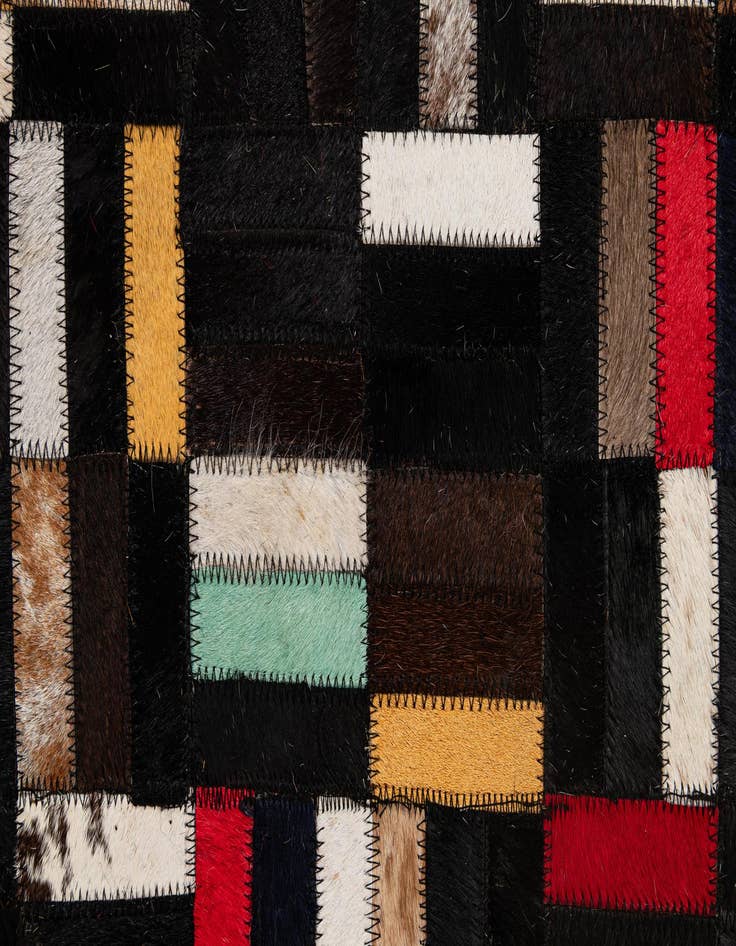 Detail image of  5' 1 x 7' 11 Cowhide - Patchwork Rug