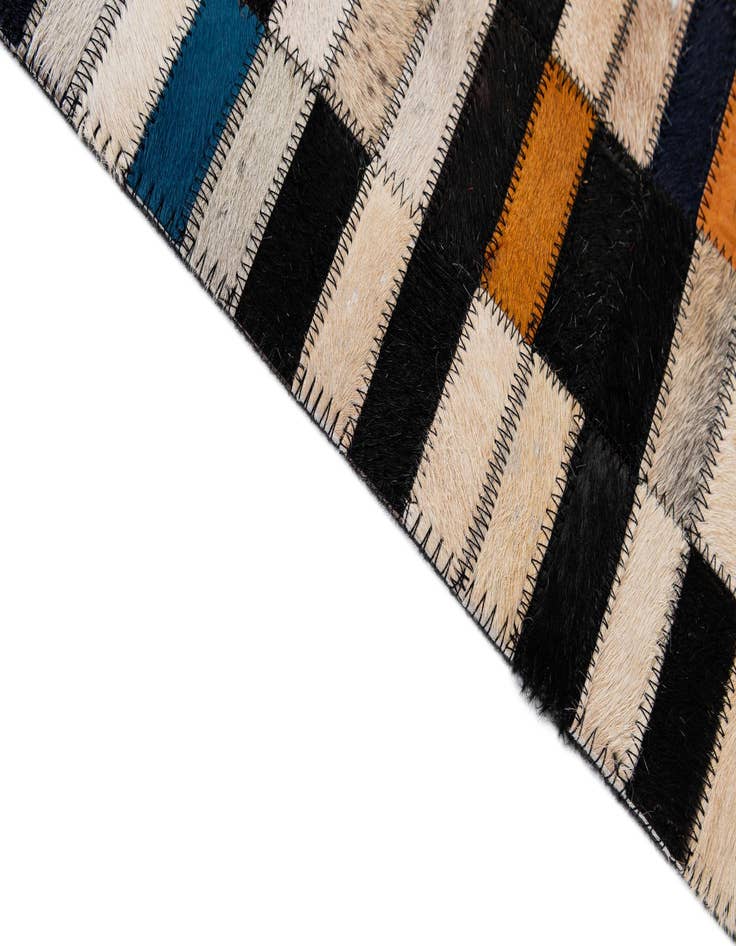 Detail image of  5' 2 x 8' Cowhide - Patchwork Rug