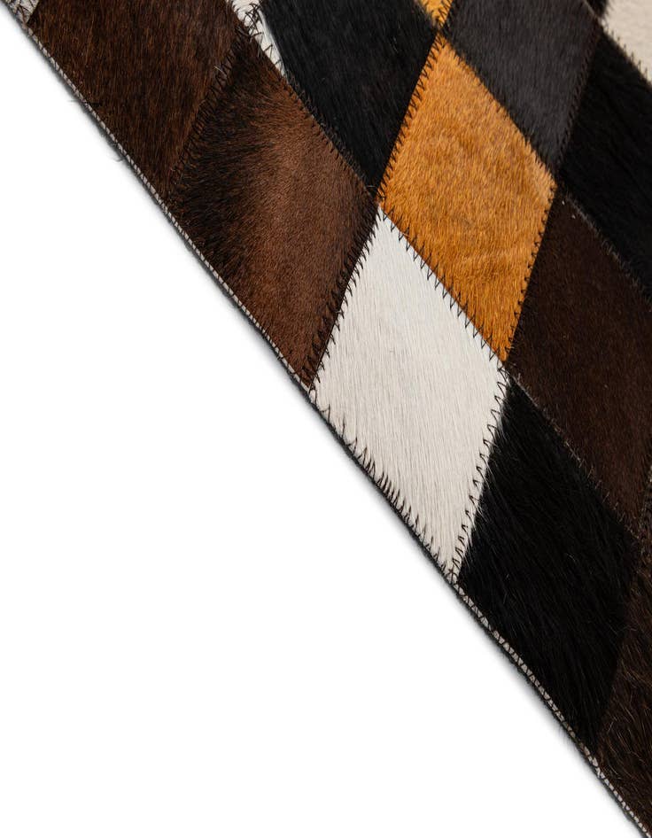 Detail image of  5' 2 x 7' 11 Cowhide - Patchwork Rug