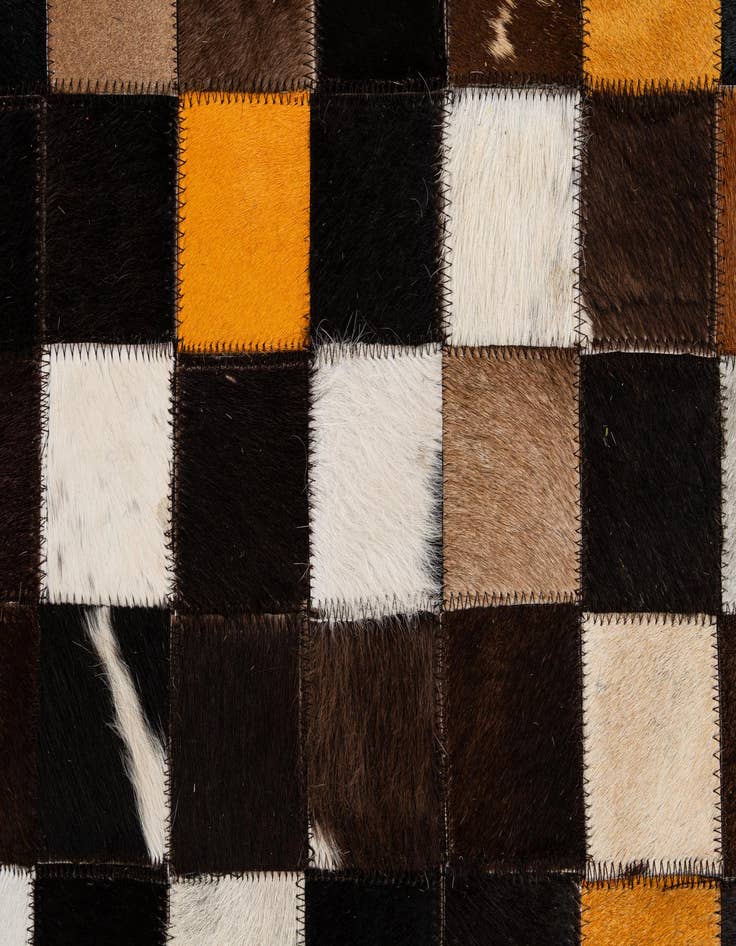 Detail image of  5' 2 x 7' 11 Cowhide - Patchwork Rug