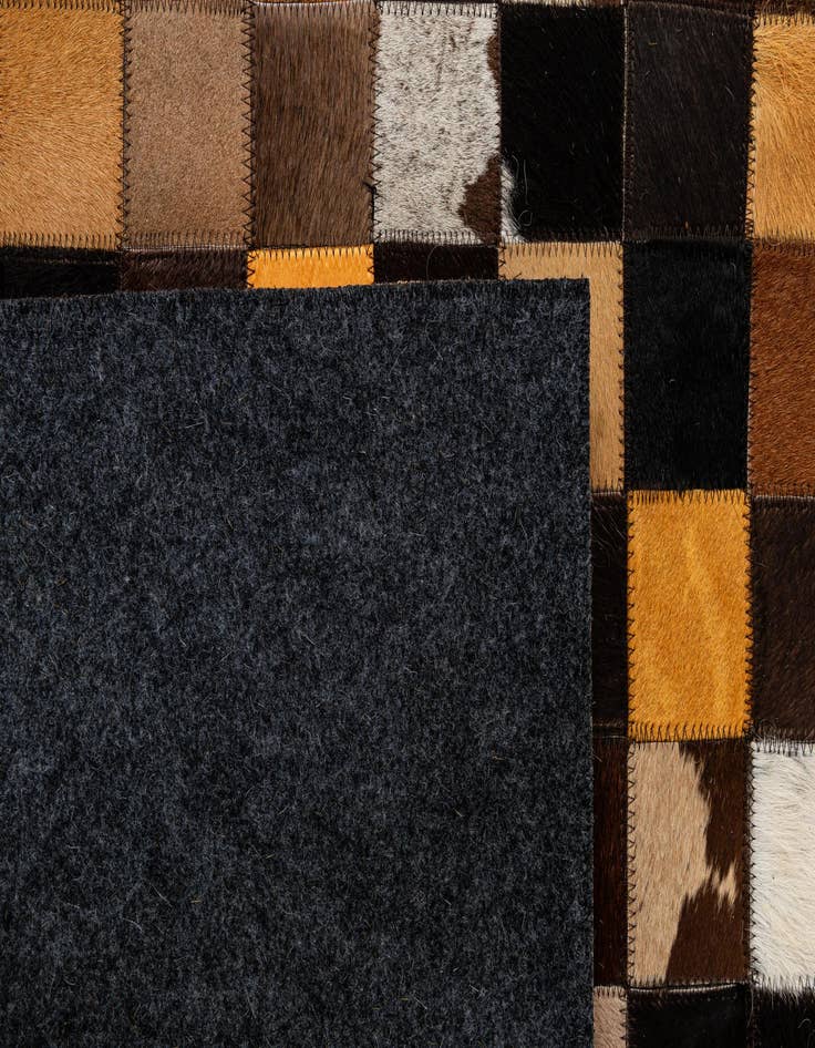 Detail image of  5' 2 x 7' 11 Cowhide - Patchwork Rug