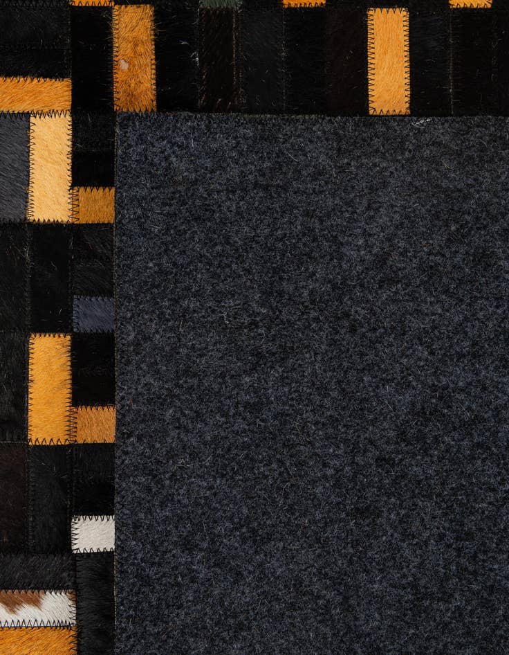 Detail image of  4' 11 x 8' 1 Cowhide - Patchwork Rug