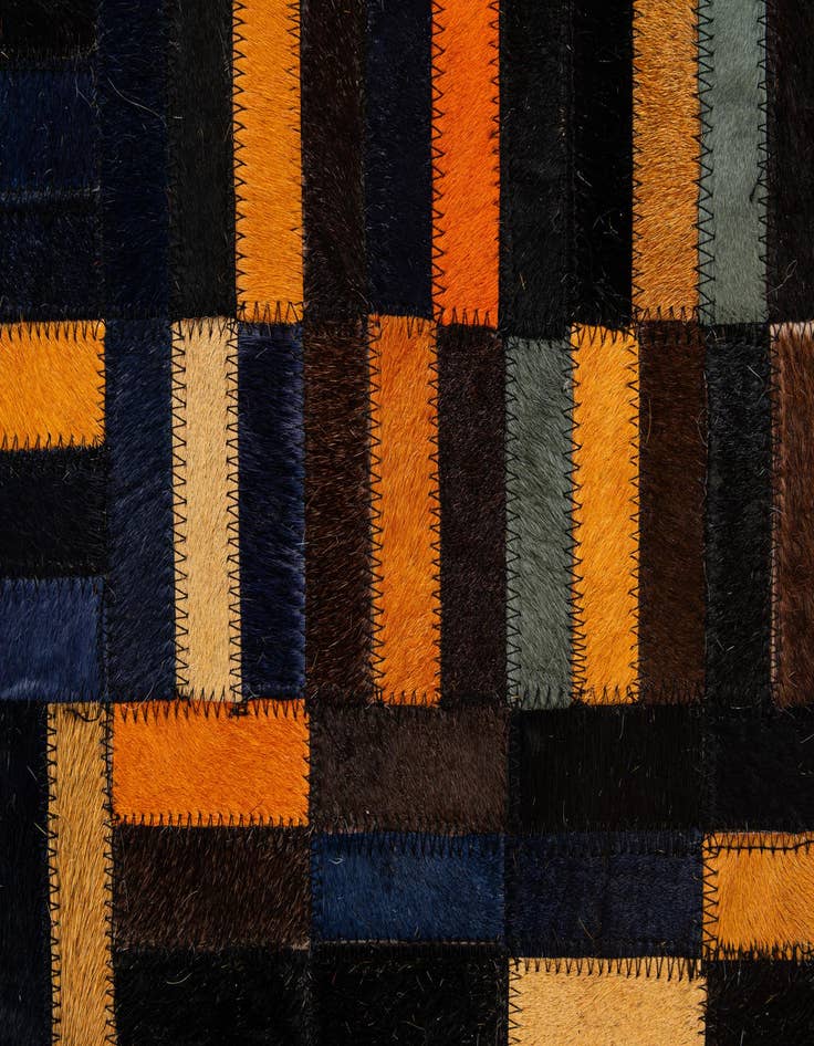 Detail image of  5' 1 x 7' 11 Cowhide - Patchwork Rug