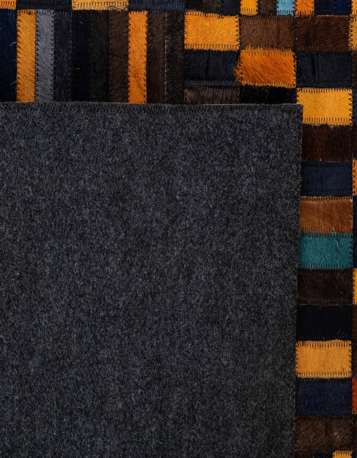 Detail image of  5' 1 x 7' 11 Cowhide - Patchwork Rug