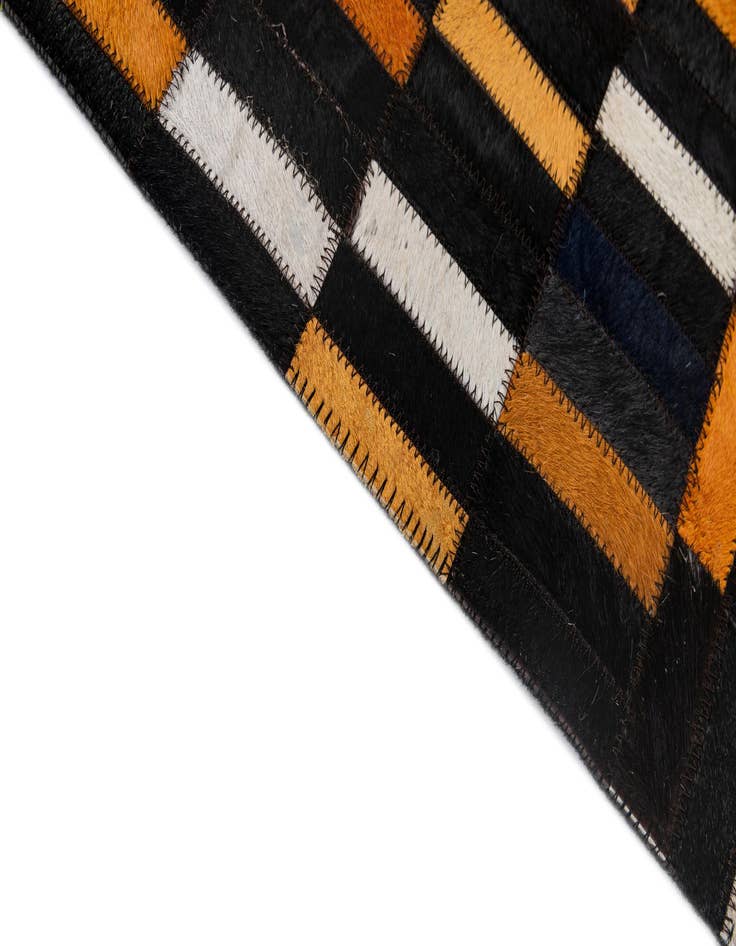 Detail image of  5' x 7' 11 Cowhide - Patchwork Rug