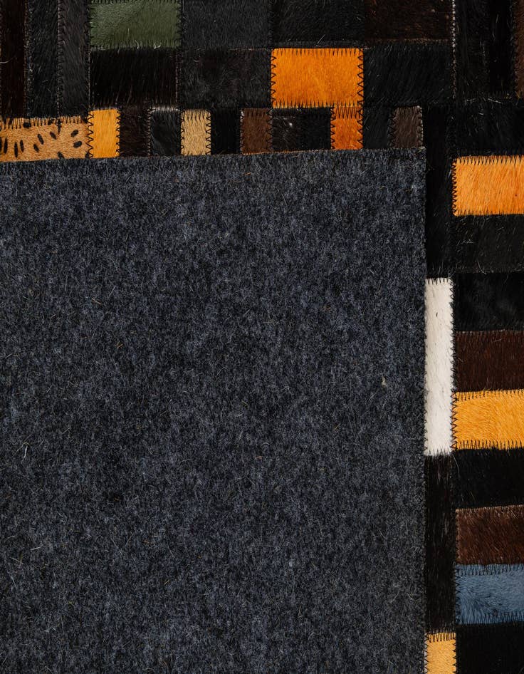 Detail image of  4' 11 x 8' 1 Cowhide - Patchwork Rug