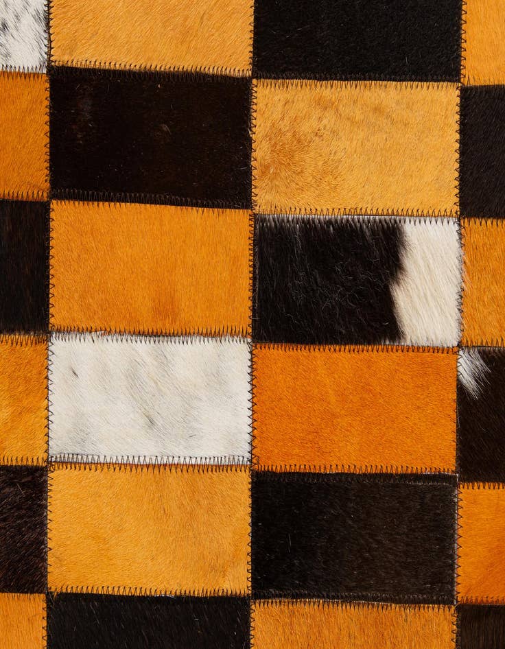 Detail image of  5' 1 x 7' 11 Cowhide - Patchwork Rug