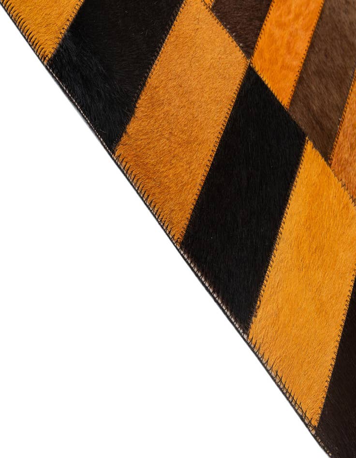 Detail image of  5' 1 x 7' 11 Cowhide - Patchwork Rug