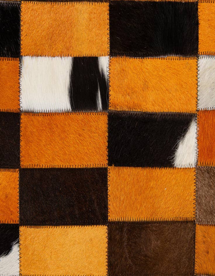 Detail image of  5' 1 x 7' 11 Cowhide - Patchwork Rug