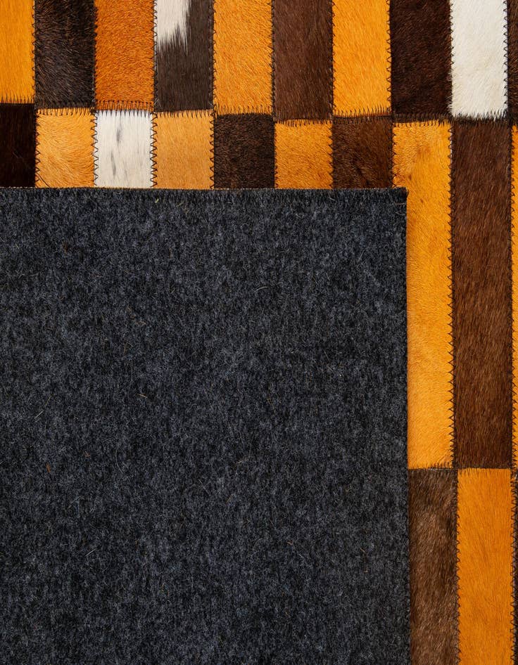 Detail image of  5' 1 x 7' 11 Cowhide - Patchwork Rug