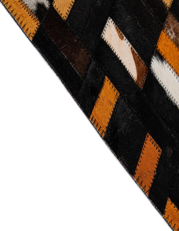 Detail image of  5' 2 x 8' 1 Cowhide - Patchwork Rug