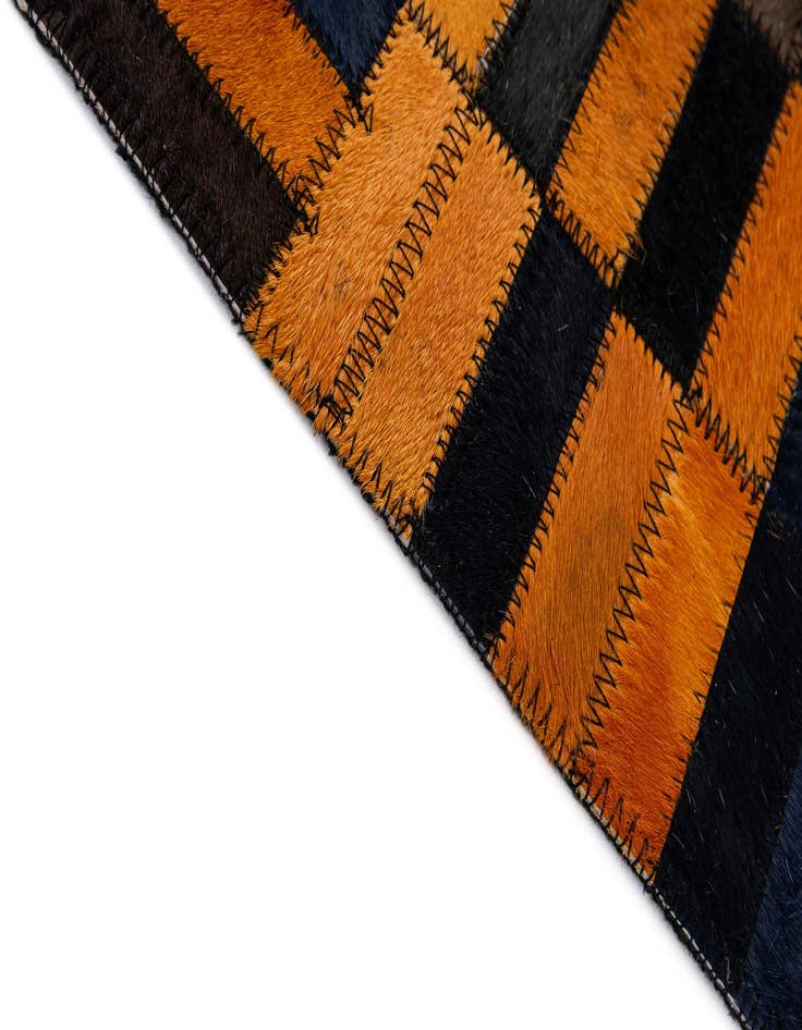 Detail image of  5' x 7' 11 Cowhide - Patchwork Rug