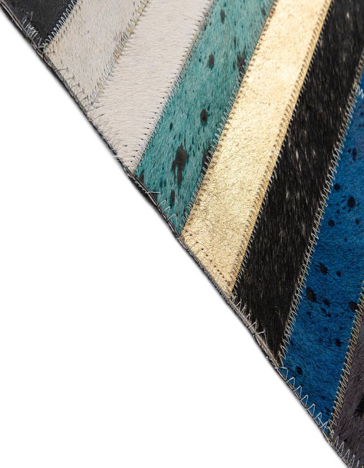 Detail image of  5' 1 x 8' 2 Cowhide - Patchwork Rug