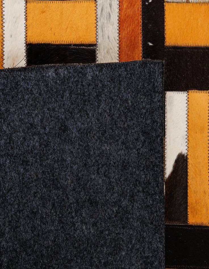 Detail image of  5' 2 x 8' Cowhide - Patchwork Rug