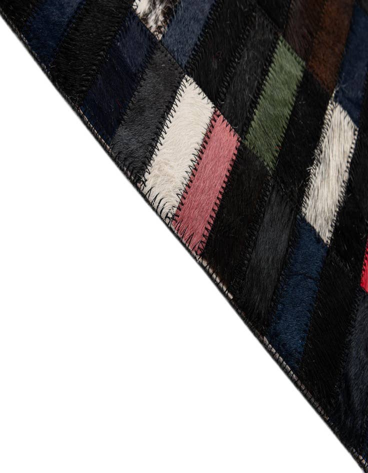 Detail image of  5' 2 x 8' Cowhide - Patchwork Rug