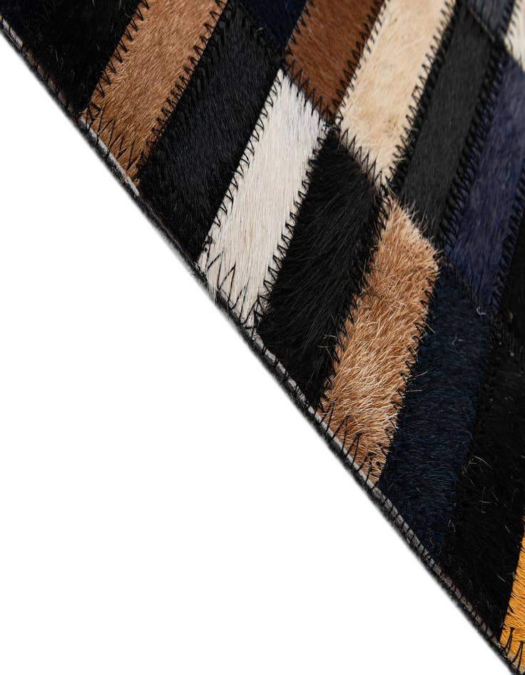 Detail image of  5' 3 x 7' 11 Cowhide - Patchwork Rug