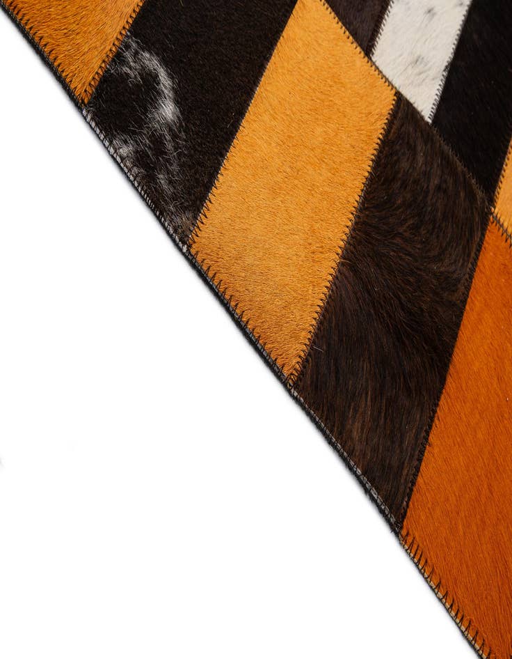 Detail image of  5' 1 x 7' 11 Cowhide - Patchwork Rug
