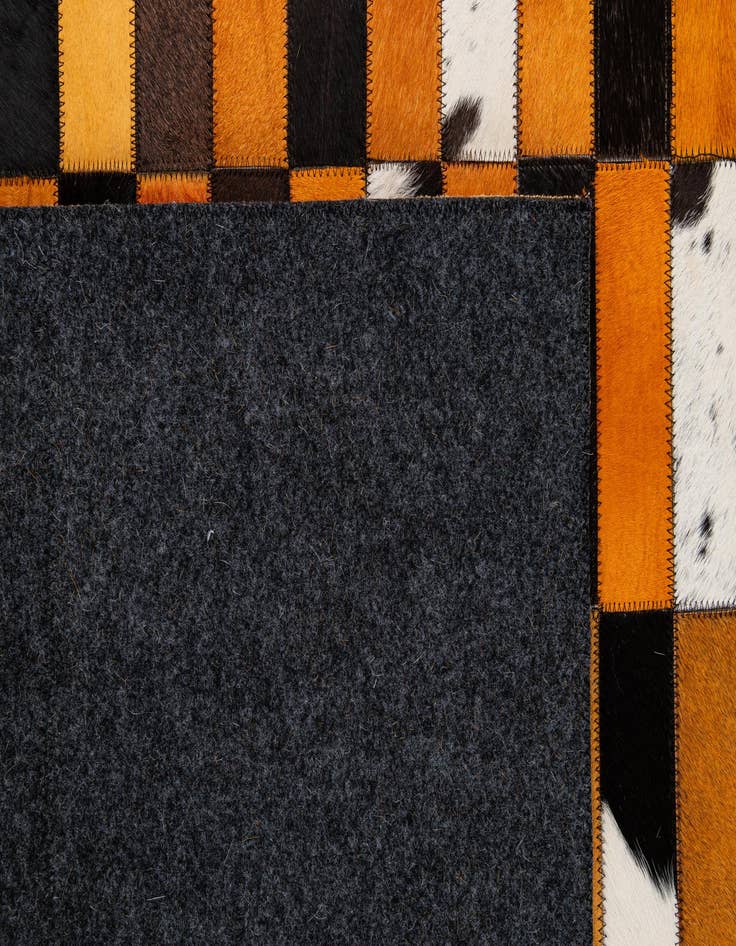 Detail image of  5' 1 x 7' 11 Cowhide - Patchwork Rug