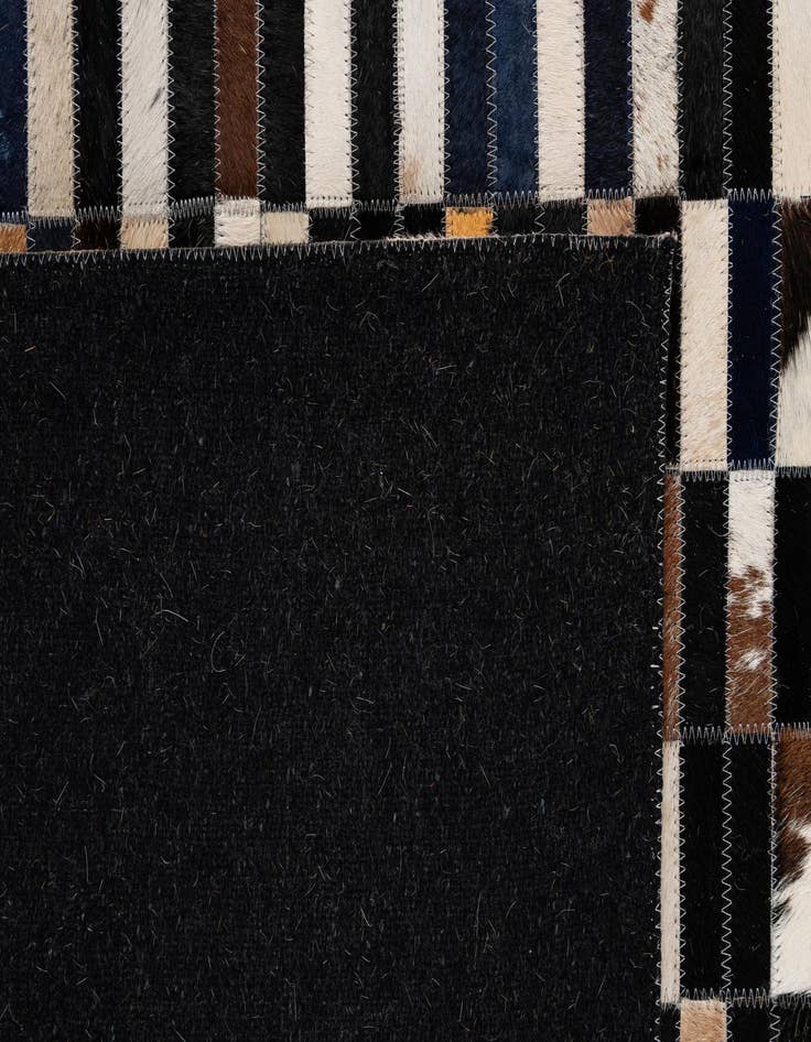Detail image of  5' 1 x 7' 11 Cowhide - Patchwork Rug