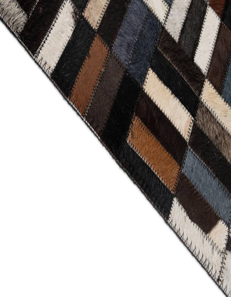 Detail image of  5' 1 x 8' 1 Cowhide - Patchwork Rug