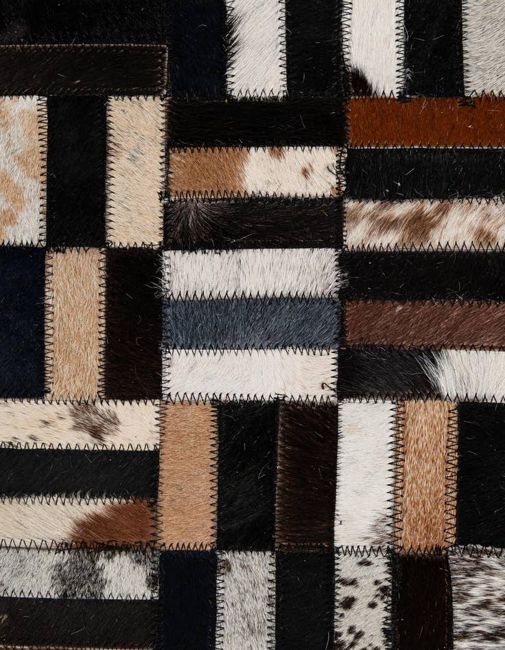 Detail image of  5' 1 x 8' 1 Cowhide - Patchwork Rug