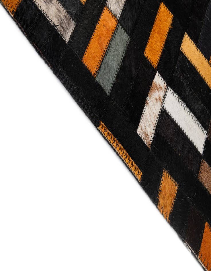 Detail image of  5' 2 x 8' Cowhide - Patchwork Rug