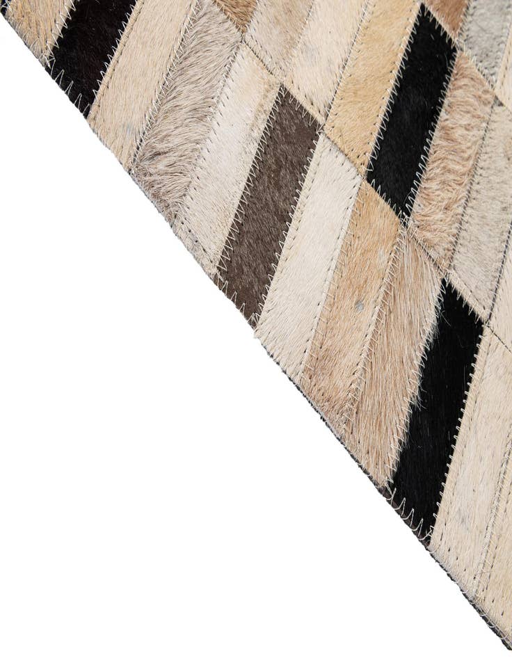 Detail image of  4' 11 x 7' 11 Cowhide - Patchwork Rug