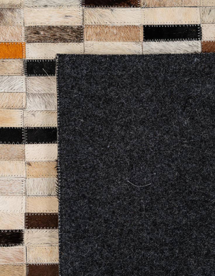 Detail image of  4' 11 x 7' 11 Cowhide - Patchwork Rug