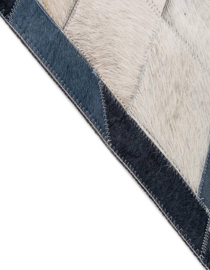 Detail image of  5' 1 x 7' 11 Cowhide - Patchwork Rug