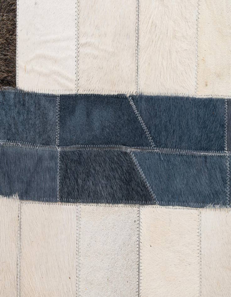 Detail image of  5' 1 x 7' 11 Cowhide - Patchwork Rug